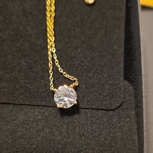 Radiant Gold Necklace with Clear Gemstone